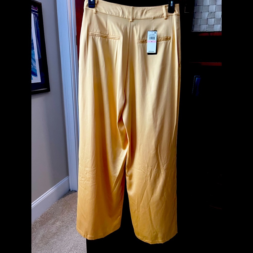 100% polyester wide leg trousers- beautiful Sahara sun color. Size 10 NWT